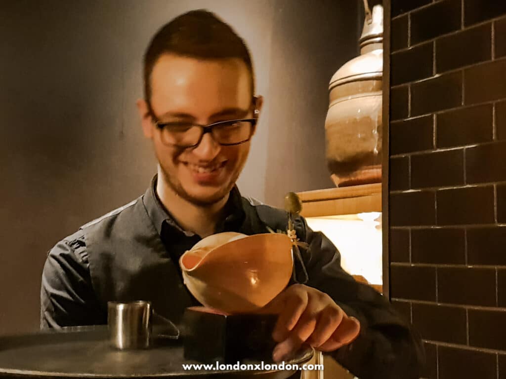 Bartender bringing a cocktail