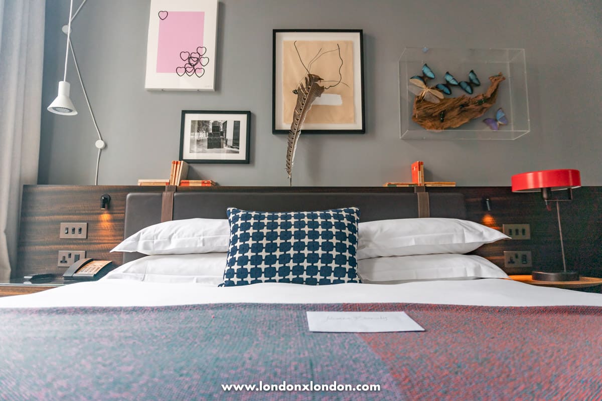The bed and art on walls 