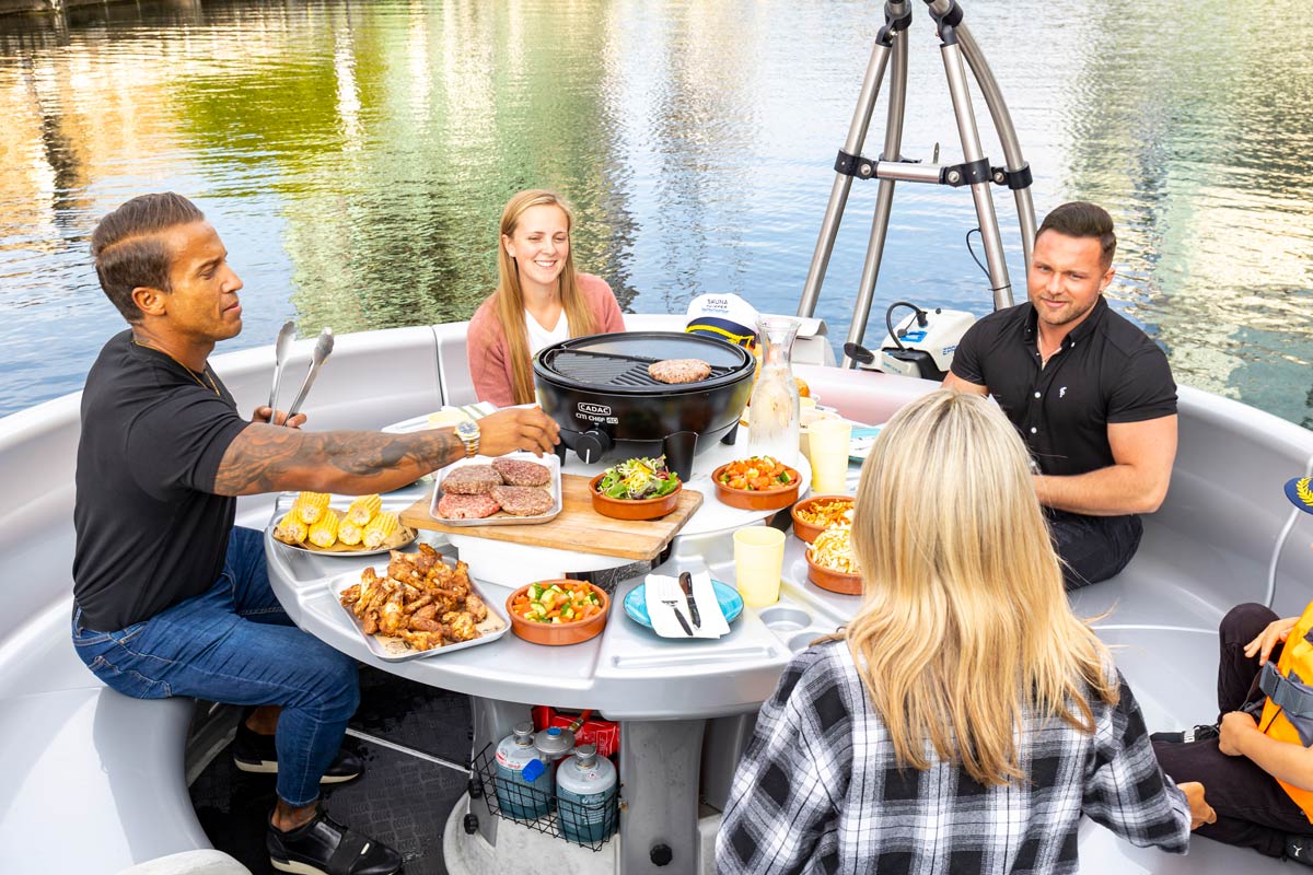 All Aboard! The BBQ Boats Lighting Up The Waterways in Canary Wharf