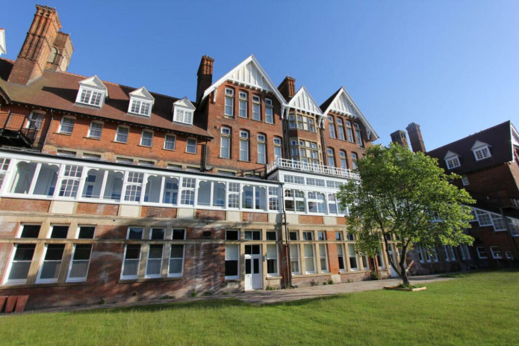 Exterior view of The Yarrow Hotel building