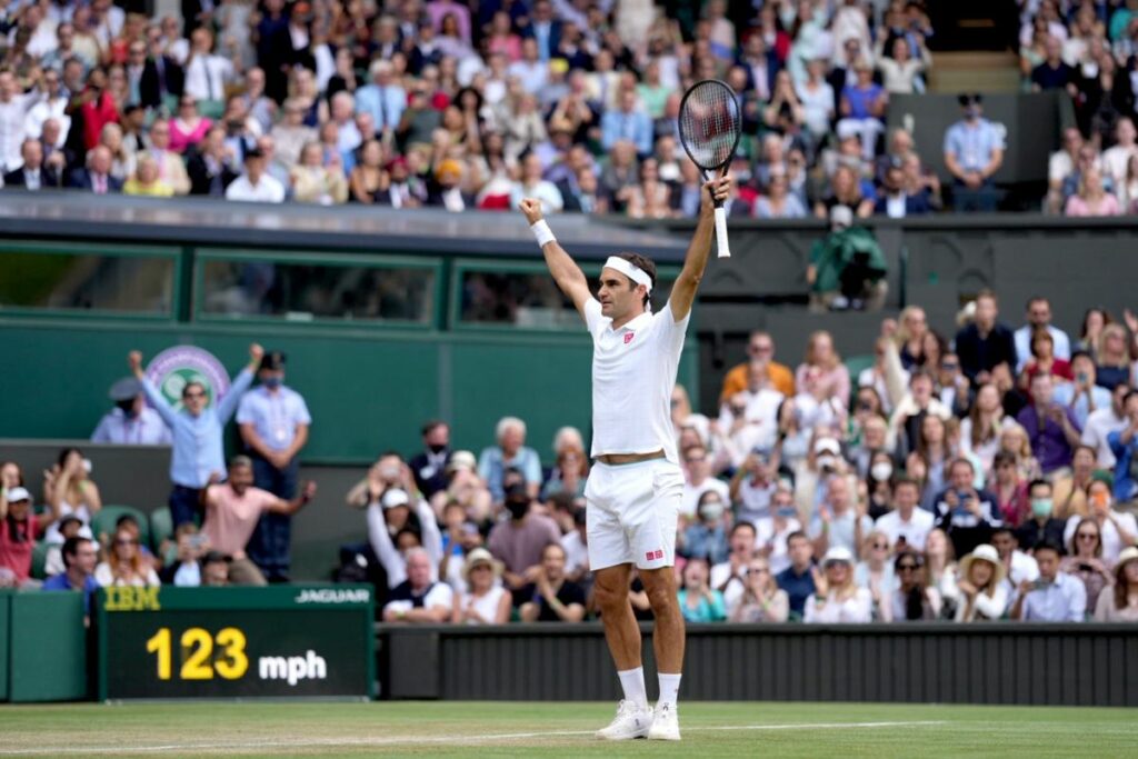 Federer playing tennis