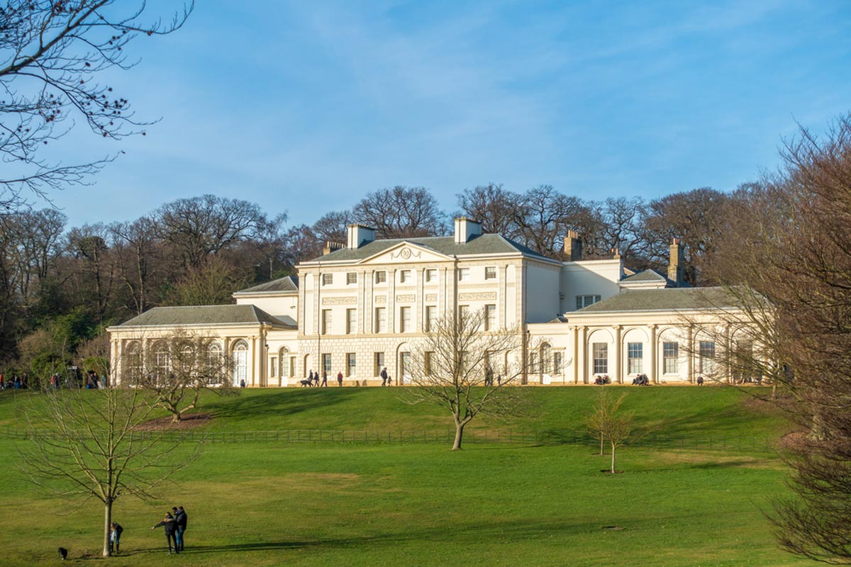 Kenwood House's white Georgian facade, seen across its landscaped grounds