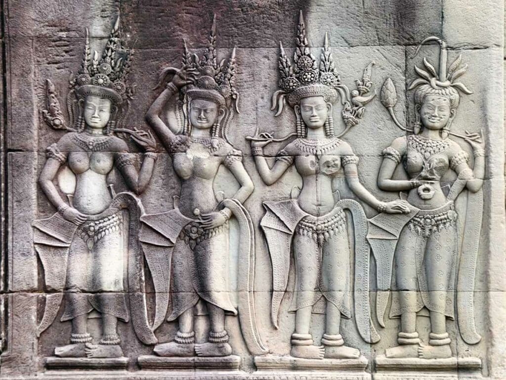Angkor Wat complex, Siem Reap, Cambodia Wall carving with four womans dancers apsara