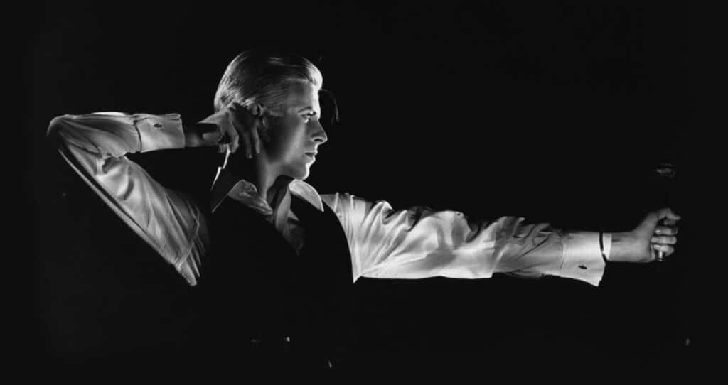 Photograph of David Bowie Performing as The Thin White Duke on the Station to Station tour, 1976. Photograph by John Robert Rowlands. © John Robert Rowlands and The David Bowie Archive