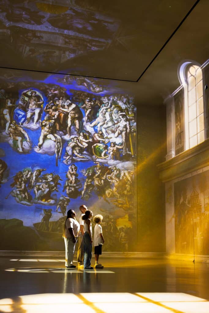 Standing inside the immersive Frameless Sistine Chapel experience
