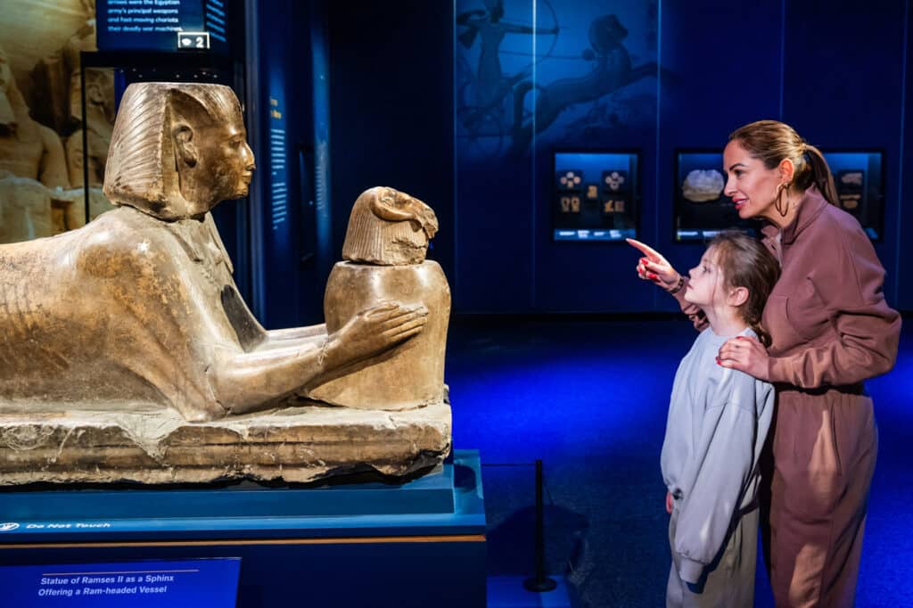 Kid, parents and sphinx