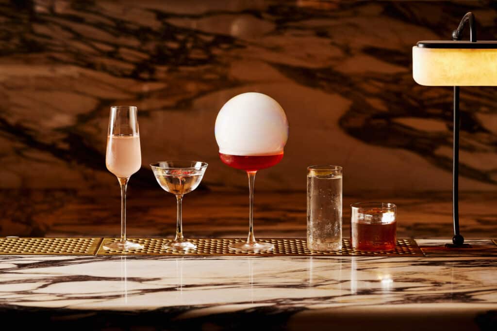 Cocktails lined up on table 