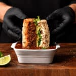 The UK’s biggest sandwich shop is giving away 500 free birria sandwiches, and building an indoor picnic to do it