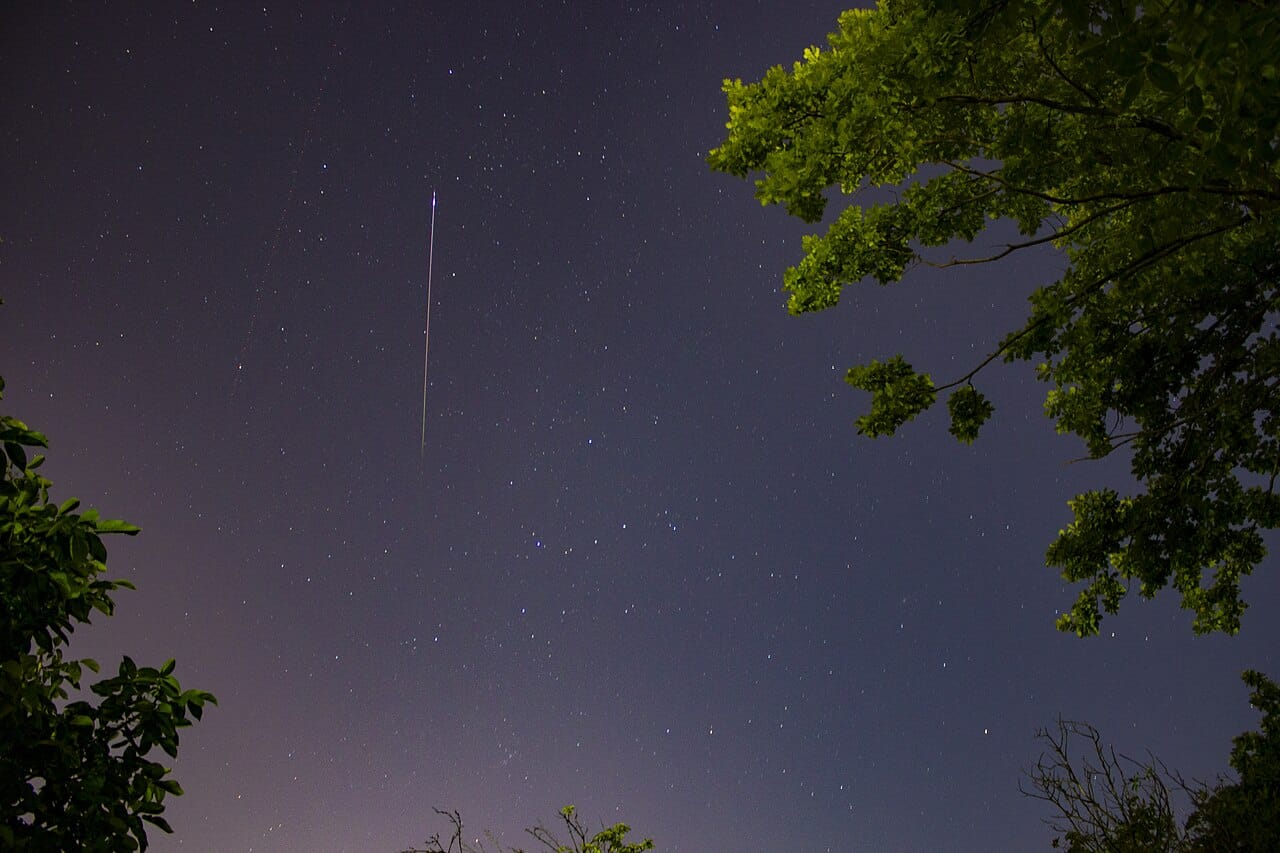 Perseid meteor streaking across the night sky