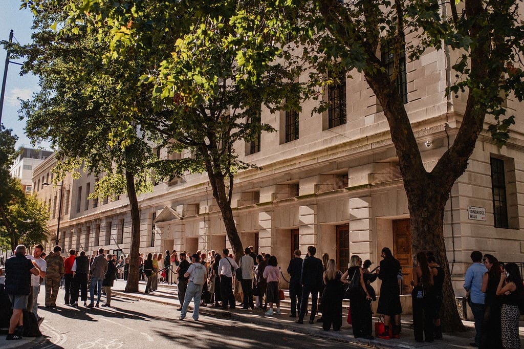 Crowds gathered outside Town Hall by Bottaccio on a sunny day