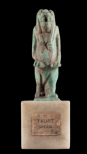 A small faience amulet of the goddess Taweret, dating from around 664-332 BCE, on display in the Two Centuries Here exhibition