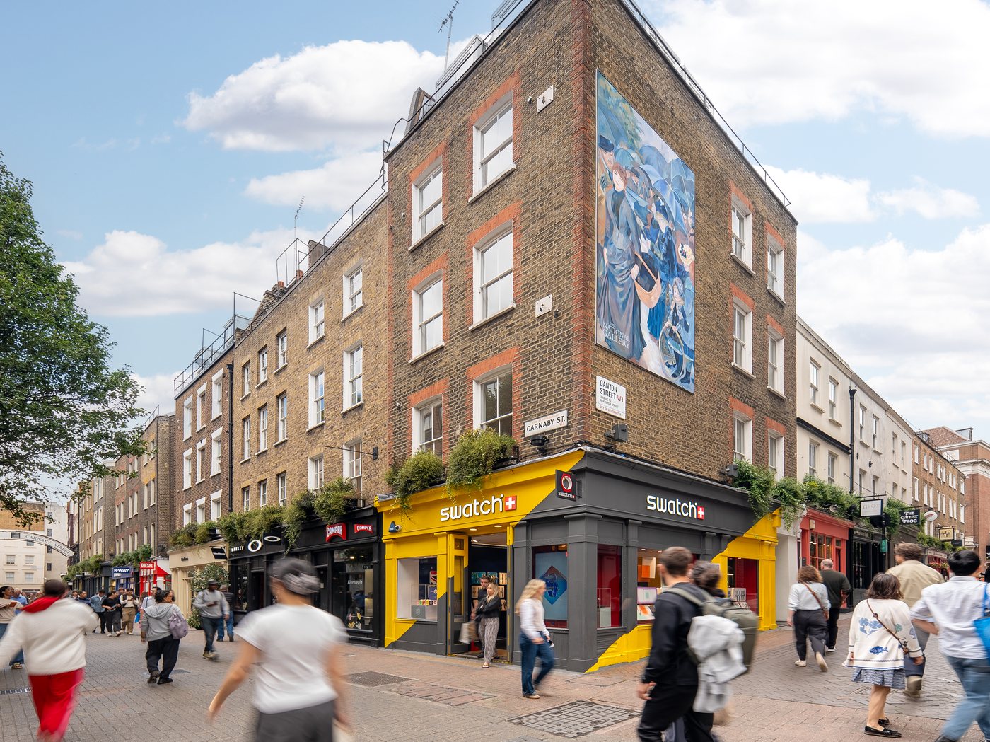 Hand-painted, five metres tall and free until March: Renoir’s The Umbrellas has landed on Carnaby Street